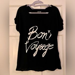 Apt 9 black shirt size large. White letter that’s says “Bon Voyage”